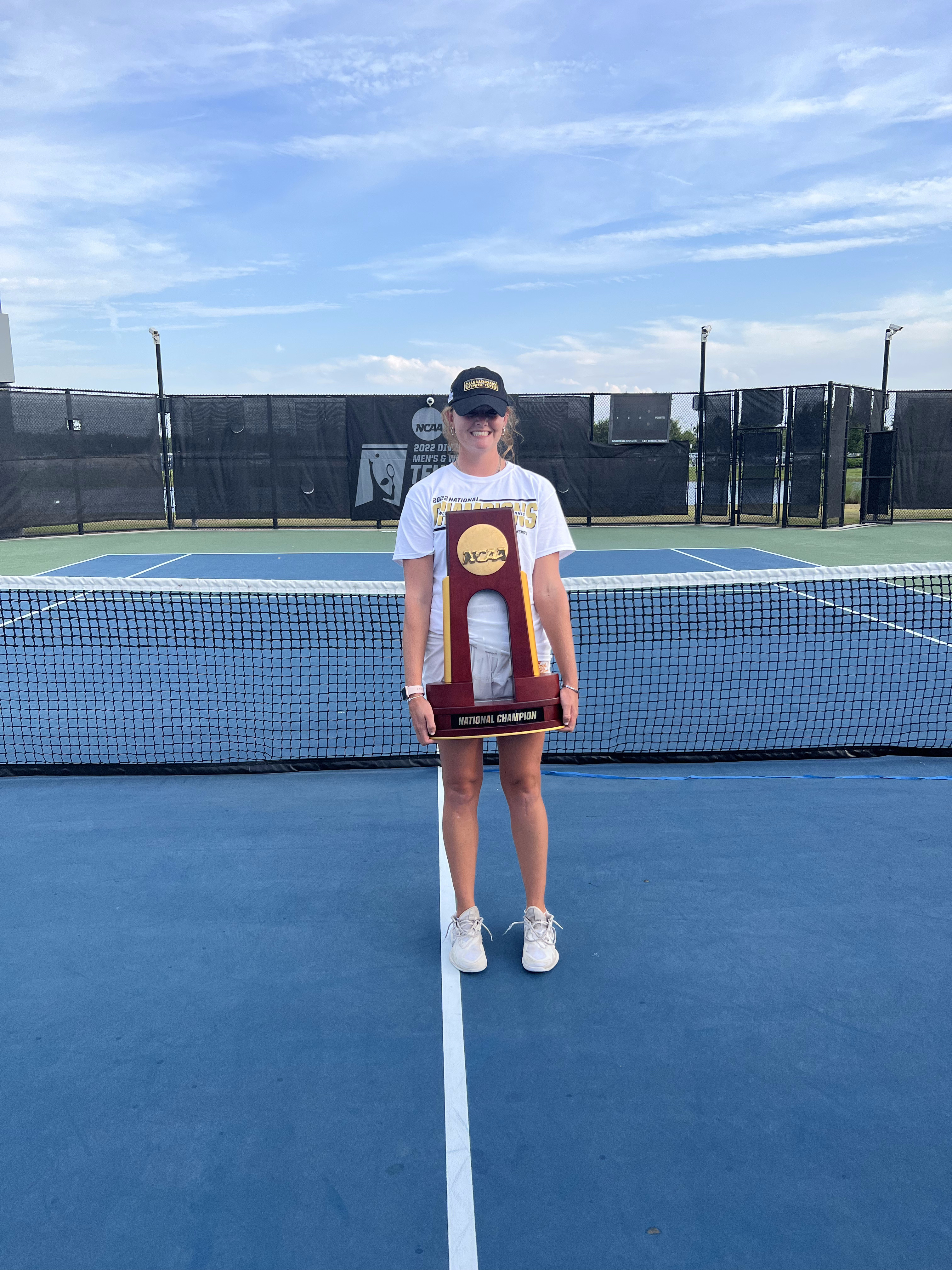 Caitlin Bernard with the 2022 NCAA National Championship trophy